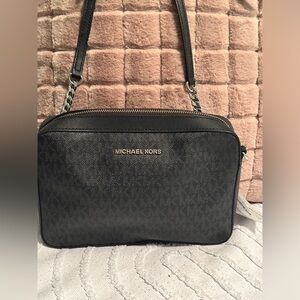 Jet Set Large Saffiano Leather
Crossbody Bag—black logo